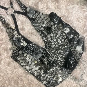 Insanely rare hand sewn cross covered backless vest